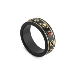 Anillo Gucci Icon de oro amarillo, corindón sintético negro y topacios
