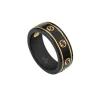 Anillo Gucci Icon de oro amarillo y corindón sintético negro