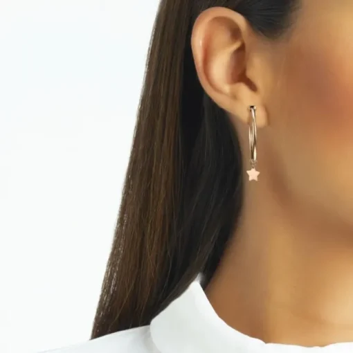 Aros medianos "Magic Stars" de oro rosa con charm de estrella