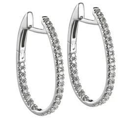 Aros ovales de oro blanco con diamantes