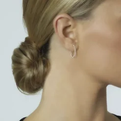 Aros ovales de oro rosa con diamantes