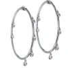 Aros "Shiny Drops" grandes de oro blanco con diamantes en chatón al aire