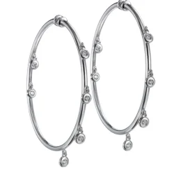 Aros "Shiny Drops" grandes de oro blanco con diamantes en chatón al aire