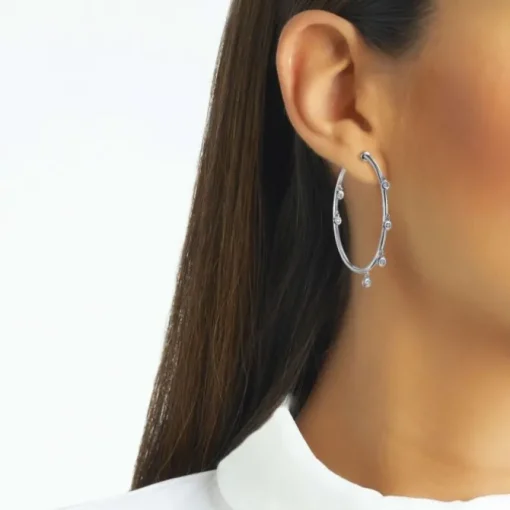 Aros "Shiny Drops" grandes de oro blanco con diamantes en chatón al aire