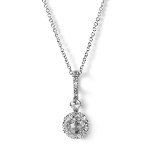 Colgante de oro blanco con diamante talla brillante y orla de diamantes