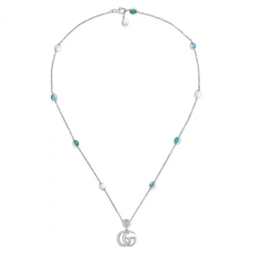 Colgante de plata Gucci GG Marmont con nácar, topacio azul y resina turquesa