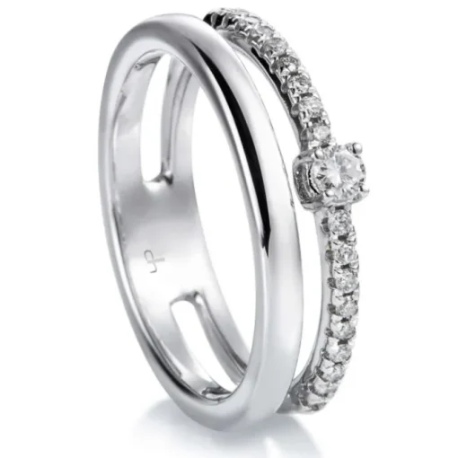 Media alianza doble de oro blanco con diamantes talla brillante y diamante central