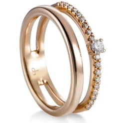 Media alianza doble de oro rosa con diamantes talla brillante y diamante central