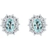 Pendientes de oro blanco con aguamarina y orla de 20 diamantes