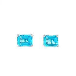 Pendientes de oro blanco con topacio azul en 4 garras talla esmeralda