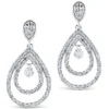 Pendientes largos de oro blanco con lagrimas de diamantes y diamante al aire