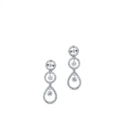 Pendientes largos de oro blanco con pavé de diamantes y diamantes al aire