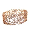 Pulsera ancha rígida de oro rosa con diamantes y pavé de diamantes