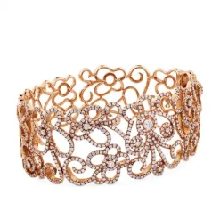 Pulsera ancha rígida de oro rosa con diamantes y pavé de diamantes