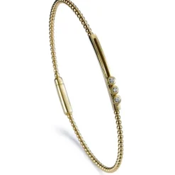 Pulsera "Bubbles" de oro amarillo con 3 diamantes móviles en chatón