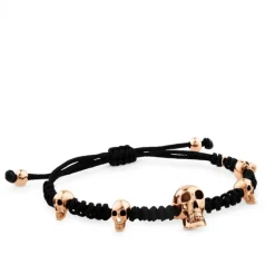 Pulsera de cordon negro con calaveras de oro rosa