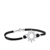 Pulsera de oro blanco y cordón negro con sol de pavé de diamantes