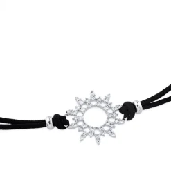 Pulsera de oro blanco y cordón negro con sol de pavé de diamantes