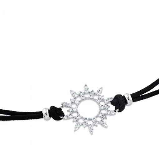 Pulsera de oro blanco y cordón negro con sol de pavé de diamantes