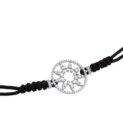 Pulsera de oro blanco y cordón negro con estrella en aro de pavé de diamantes