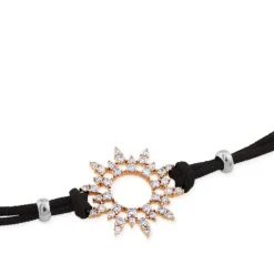 Pulsera de oro rosa y cordón negro con sol de pavé de diamantes