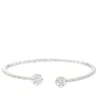 Pulsera rígida abierta de oro blanco con diamantes y terminaciones en flor