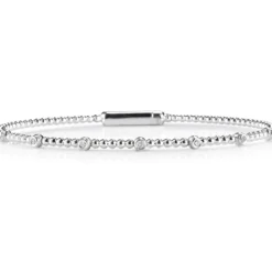 Pulsera rígida "Bubbles" de oro blanco con diamantes en chatón