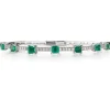 Pulsera rígida de oro blanco con esmeraldas y diamantes