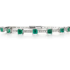 Pulsera rígida de oro blanco con esmeraldas y diamantes
