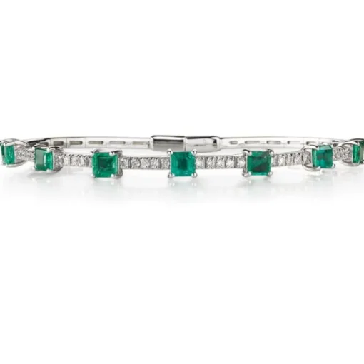 Pulsera rígida de oro blanco con esmeraldas y diamantes