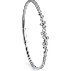 Pulsera rígida "Shiny Drops" de oro blanco con diamantes en chatón y diamantes en 4 garras