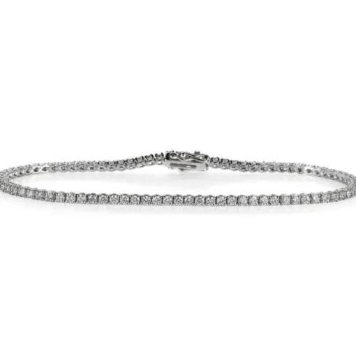 Pulsera Riviere de oro blanco con diamantes talla brillante en garra