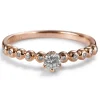 Solitario "Bubbles" de oro rosa con diamantes