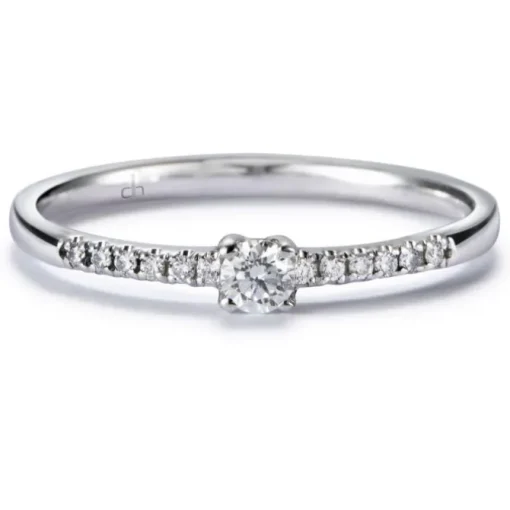 Solitario "Isabella" de oro blanco con diamante talla brillante y diamantes en garra