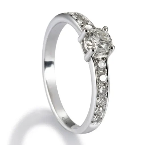 Solitario "Norah" de oro blanco con diamante central en garra y brillantes en montura