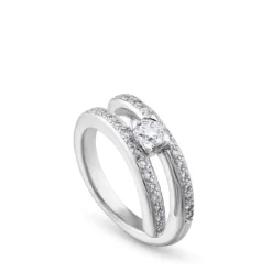 Solitario "Twins" de oro blanco con diamante central 0.34 quilates en garra y pavé en montura