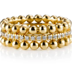 Sortija "Bubbles" de oro amarillo con hilera de diamantes en garra