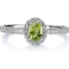 Sortija "Caramelo" de oro blanco con Peridoto talla oval y diamantes