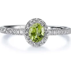 Sortija "Caramelo" de oro blanco con Peridoto talla oval y diamantes