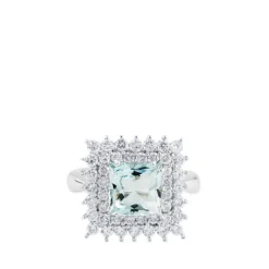 Sortija de oro blanco con aguamarina y orla de diamantes