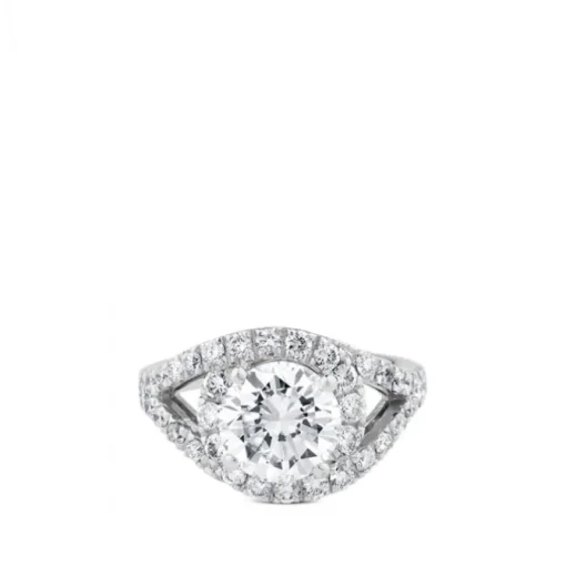 Sortija de oro blanco con diamante central talla brillante y pavé de diamantes